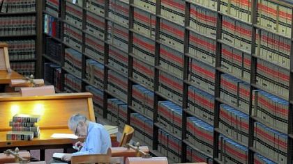 Attorney Allen Brunwasser, 89, reads in the  Duquesne University/Allegheny County Law Library in the City County Building, Downtown. Law students are still taught to do book research, but in practice, it is increasingly done through online services such as LexisNexis and Westlaw.