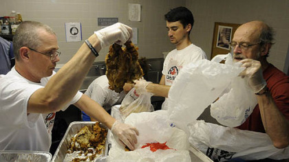 Lasallian volunteers help prepare and serve the Sunday mid-day meal at the Jubilee Kitchen on Wyandotte Street.
