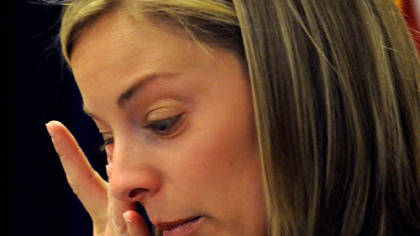 Brooke Hicks pauses as she talks about her husband, FBI Special Agent Samuel Hicks, this morning in the Federal Courthouse. She said of the negotiated sentence of Christina Korbe: "The most important thing was she stood up in that courtroom and accepted responsibility for shooting Sam."