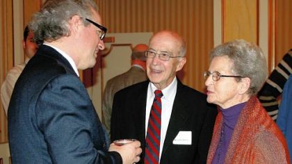 Manfred Honeck greets Joe and Peggy Charny at the season announcement event held for PSO subscribers and donors Tuesday at Heinz Hall.