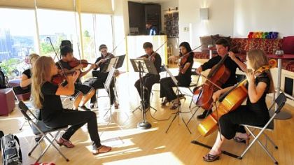 Mt. Lebanon High School students provide music for guests.