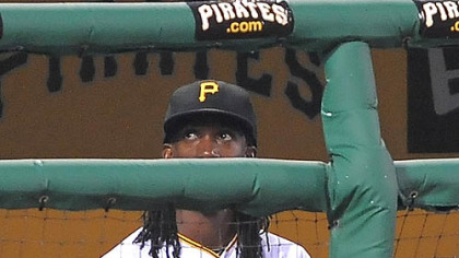 Pirates outfielder Andrew McCutchen sits in the dugout after being benched by manager Clint Hurdle against the Dodgers at PNC Park Thursday.