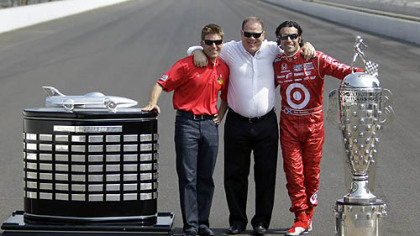 Car owner Chip Ganassi, center, poses with Indianapolis 500 champion Dario Franchitti, right and NASCAR Daytona 500 champion Jamie McMurray in Indianapolis, May 31, 2010.