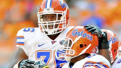 Marcus Gilbert, 76, of the Florida Gators celebrates with teammate Frankie Hammond, 85, after scoring a touchdown aganst the Tennessee Volunteers at Neyland Stadium on September 18, 2010 in Knoxville.