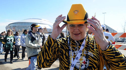 Dolly McQuaid of Bethel Park models her Western-style Steelers garb.