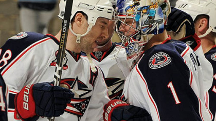 Blue Jackets forward R.J. Umberger congratulates goaltender Steve Mason after a 4-1 win Tuesday at Consol Energy Center.