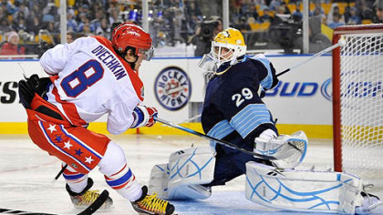 Capitals captain Alex Ovechkin is stopped y Penguins goaltender Marc-Andre Fleury during the Winter Classic at Heinz Field on Jan. 1.