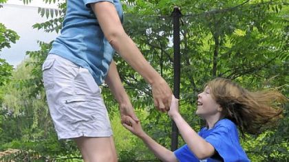 Denise Malchano was once in a wheelchair with her multiple sclerosis, but since taking a new drug, Gilenya, she can now play with her son, Brandon, on their backyard trampoline.
