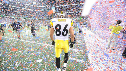 Steelers wide receiver Hines Ward walks off the field thru confetti after losing Super Bowl XLV Sunday at Cowboys Stadium in Arlington, Texas.
