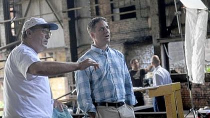 "Antiques Roadshow" host, Mark L. Walberg, right, talks with Jim Kapusta, a volunteer tour guide for the Steel Industry Heritage Corp., before for filming a segment for the show at the Carrie Blast Furnace complex in Rankin.
