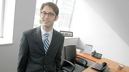 George Ernst in the Monroeville office of his virtual law firm Ernst & Riley that specializes in immigration issues.