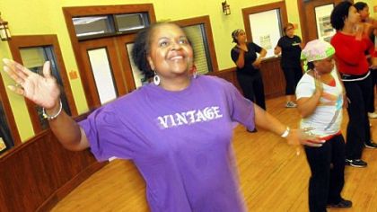 Teri Bridgett, left, 62, of East Liberty practices zumba with other student at the Union Project building in Highland Park.