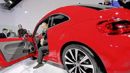 Klaus Bischoff, head of design for Volkswagen Brand, introduces the 2012 Volkswagen Beetle in New York on Monday.