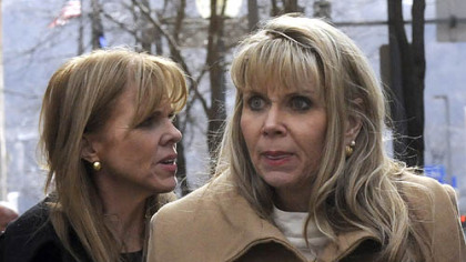 State Sen. Jane Orie, left, and her sister, Janine Orie, leave the Allegheny County Courthouse after a mistrial was declared.