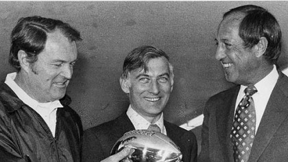 Steelers coach Chuck Noll and team owner Dan Rooney accept the Lombardi Trophy from NFL commissioner Pete Rozelle following Super Bowl XIII.