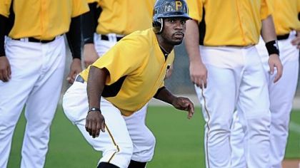 Cory Wimberly breaks for home in drills Monday in Bradenton, Fla.