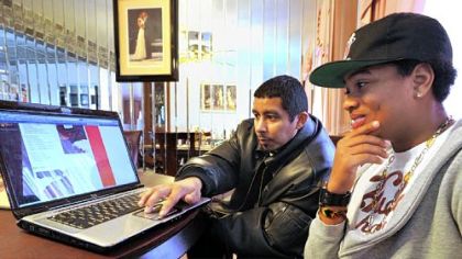 Cultural consultant David Hudley visits with client Tristien Pierre, 14, at his Penn Hills home.