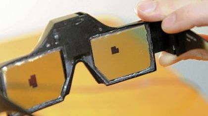 In this series, the shifting pixel areas on the lenses of the Dynamic Eye glasses show how the frames' processing system responds to changes in the direction of glare.