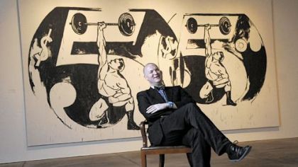 Eric C. Shiner, recently appointed director of The Andy Warhol Museum, photographed at the museum in May in front of Andy Warhol's "Double $5/Weightlifter" of 1985-86.