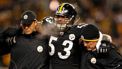 Steelers center Maurkice Pouncey is helped off of the field after being injured in the first quarter of the AFC championship game at Heinz Field Sunday.