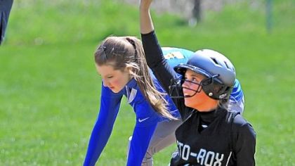 Sto-Rox's Erin McBane calls time after sliding safely into second during a lopsided victory against Cornell last week.