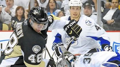 Tyler Kennedy is stopped by Tampa Bays goaltender Dwayne Roloson in Game 7 Wednesday at Consol Energy Center. The inability to consistently get pucks past Roloson, especially on the power play, ultimately knocked the Penguins out of the Stanley Cup playoffs in the first round.
