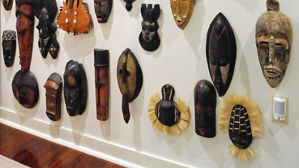 Robert Hill's collection of African masks in his Trimont condo.
