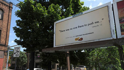 A billboard for the Hear Me project, which seeks to give voice to area children's thoughts, dreams and fears, along Second Avenue in Hazelwood.