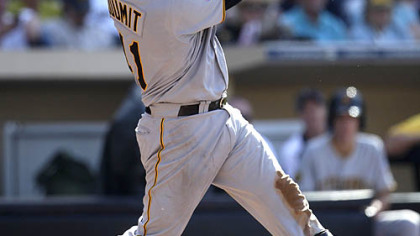 The Pirates' Ryan Doumit launches a grand slam in the third inning Wednesday at Petco Park.