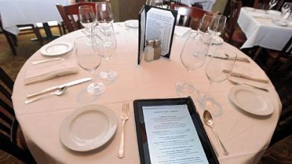 The Carlton restaurant, Downtown, now offers its wine list on iPads to keep the list as up to date as possible.