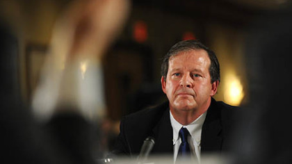 Dave Spigelmyer of Chesapeake Energy listens Thursday as State Senator Jim Ferlo questions him at a Marcellus Shale Town Hall meeting held by the State Senate Democratic Policy Committee in Oakland.
