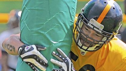 Steelers linebacker Larry Foote participates in blocking drills during training camp at Saint Vincent College in Latrobe.