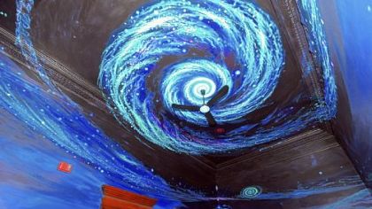 The ceiling painting by Ian Green of the renovated teen room at the library.