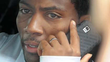 Steelers safety Ryan Clark takes a phone call before leaving the South Side training facility Tuesday after federal judge Susan Nelson had ruled a day earlier that the lockout by the NFL was illegal. She also refused to grant the league a stay of her ruling, thus opening team facilities to the players while the appeals process moves forward.
