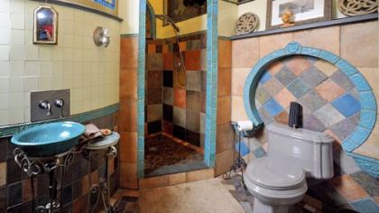 Artist Dan Riccobon crafted his own custom tiles for his master bath.