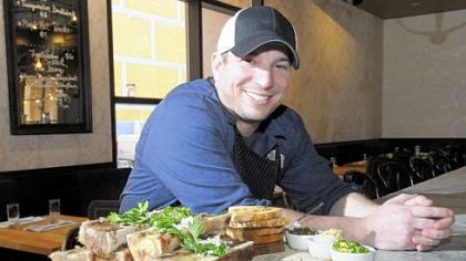 Richard DeShantz of Meat & Potatoes with his bone marrow with grilled breads.