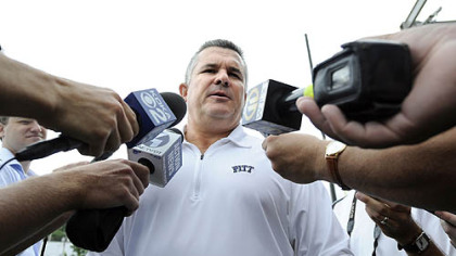 Pitt football coach Todd Graham, with staff members, speaks to season ticket holders Sunday at Petersen Event Center.