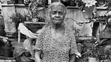From the book "Places for the Spirit: Traditional African American Gardens" by Vaughn Sills: portrait of Annie Belle Sturgehill in Athens, Georgia, circa 1988.