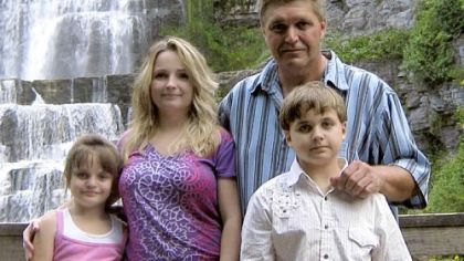 Southwestern Pennsylvania cookbook compiler Douglas Robinson with, from left, Abby, wife Laura and Doug Jr.