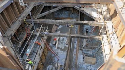 Construction workers pour cement for the walls of a new pump station being constructed for Pennsylvania American Water along East Carson Street at Becks Run Road.