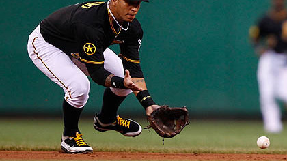 The Pirates' Ronny Cedeno fields a ground ball against the Cardinals during Friday's game at PNC Park.
