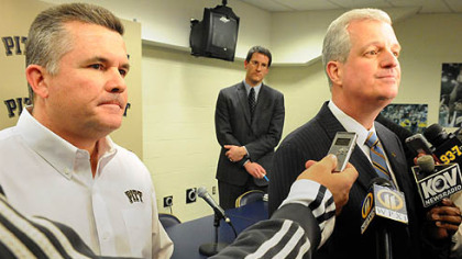 Pitt football coach Todd Graham, left, and athletic director Steve Pederson.