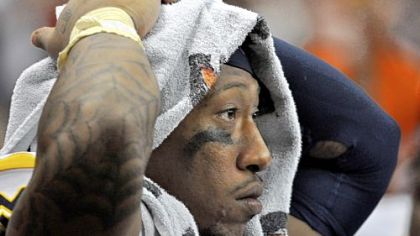 West Virginia's Bruce Irvin looks on near the end of the fourth quarter in what finished as a 49-23 loss for No. 11 West Virginia Friday night in Syracuse, N.Y.