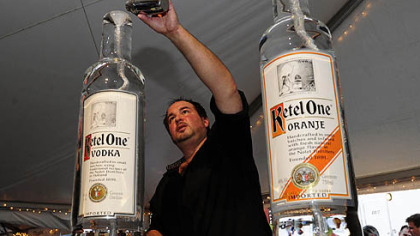 Paul Lauteri pours the booze.