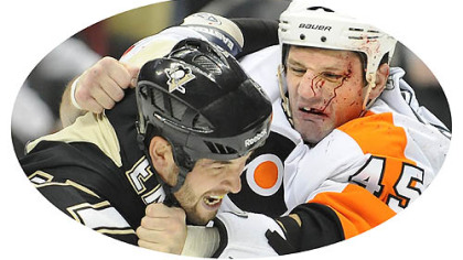 In this file photo Penguins Deryk Engelland fights Flyers Jody Shelly.