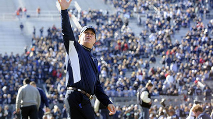 Penn State interim head football coach Tom Bradley waves to fans on the field before his team''s game against Nebraska today.