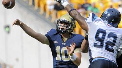 Quarterback Trey Anderson, throwing a pass in last Saturday's victory against Maine, is one of seven freshmen who have seen playing time this season for Pitt.
