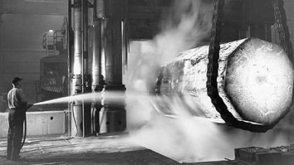 Union manufacturing employees helped build the middle class in America. Here, a steelworker at the Homestead Works sprays a glowing ingot during war production in 1943.