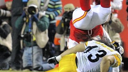 Troy Polamalu made the tackle on Kansas City's  Steve Maneri on the Chiefs' first series of the game, then left with an apparent head injury.