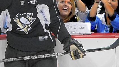 Sidney Crosby participated in the Penguins' first practice of training camp Saturday and these fans wanted to capture it with the cameras on the cell phones.